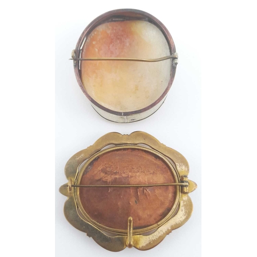 302 - A Victorian pinchbeck brooch, with an oval painting of a capriccio on copper, together with an oval ... 