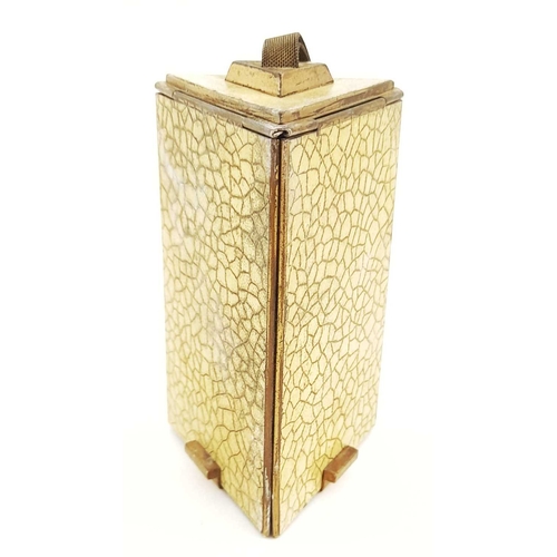 327 - An Art Deco metal pyramid triple compact, on a woven metal strap, opening to reveal a mirror, a powd... 