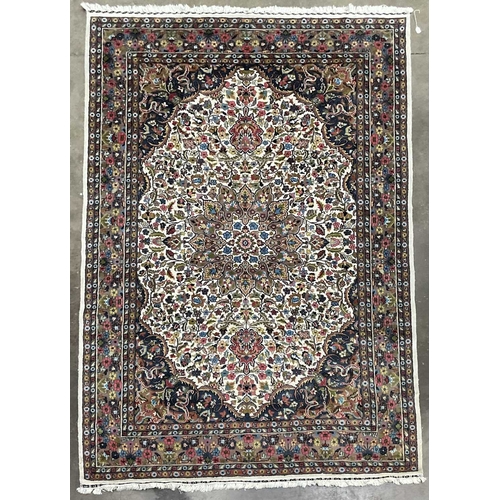 341A - A large Kashmar-type wool floral rug in a brown, cream, red and blue palette, approx 282cm long, 190... 