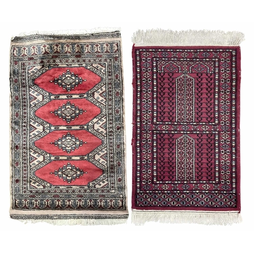 342 - A wool prayer rug, red on grey ground with another, approx 112cm long, 63cm wide and the other appro... 