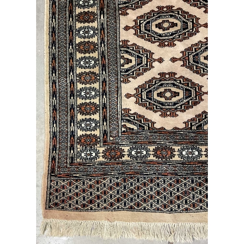 343 - Two rugs of tribal/Oriental design, one decorated with floral geometric forms on a cream ground, app... 