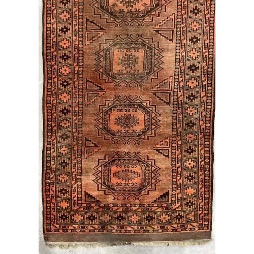 350A - Burt orange runner with central geometric octagon pattern, tribal/Oriental design, approx 430cm long... 