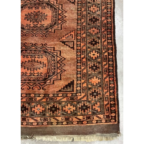 350A - Burt orange runner with central geometric octagon pattern, tribal/Oriental design, approx 430cm long... 