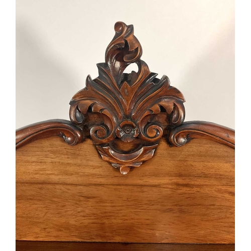 360 - A mahogany chiffonier, 19th century, acanthus finial atop a raised panel back with a bow shaped shel... 