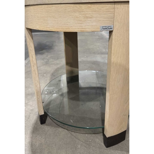 366 - A Brigitte Forestier 'Grandeur de Nature' round table in light oak with a central glass shelf, 61cm ... 