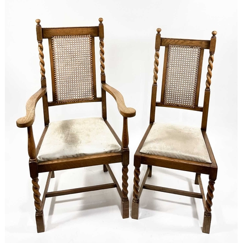 373 - A set of six oak dining chairs, barley twist, rattan backed, leather drop in seats. 4 side chairs me... 