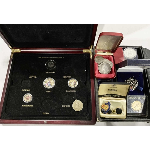 38 - A collection of coins and commemorative sporting medals to include a Queen Victoria, 1887 double flo... 