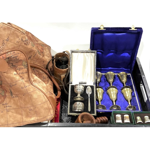 39 - A hold-all bag together with a boxed Christening set, leather-cased binoculars, collectable ceramic ... 