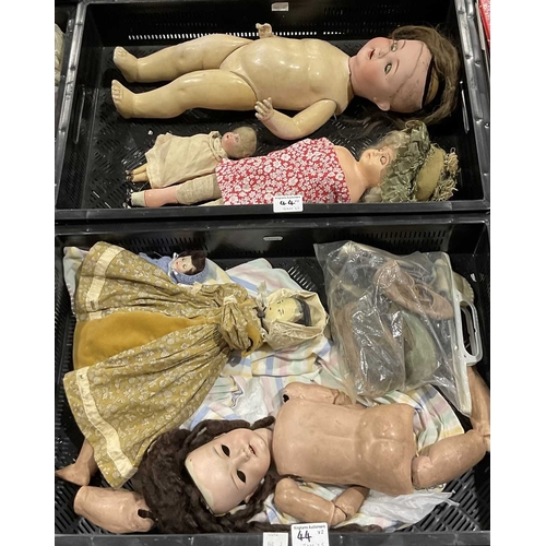 44 - A collection of late 19th and 20th century dolls, including a wooden Victorian painted peg doll, Ger... 