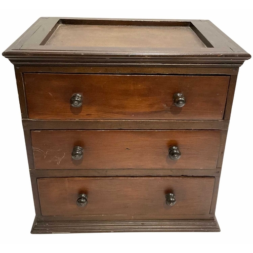 46 - A mahogany apprentice piece, small chest of three drawers with turned handles, lower two drawers par... 