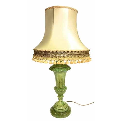 48 - A green classical urn hards stonelamp with silk shade, 88cm high together with a carved wood magazin... 