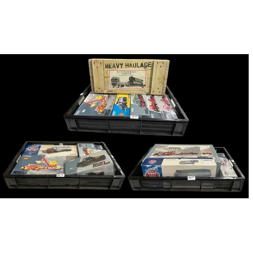 75 - A large collection of boxed Corgi diecast haulage vehicles including models from the 'Heavy Haulage ... 