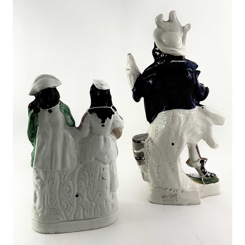 90 - A Victorian Staffordshire pottery figure of 'Will Watch', modelled standing beside two barrels, hold... 