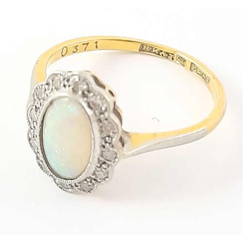 264 - An early 20th century 18ct gold opal and diamond cluster ring