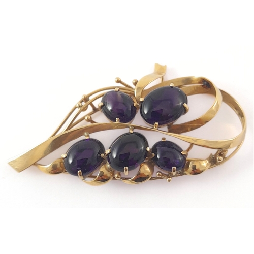 304 - A 9ct gold amethyst spray brooch