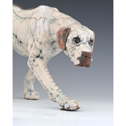 95 - Keza Rudge (British, 20th century), model of a hound, slip cast raku, signed to the underside, width... 