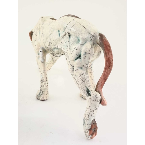 95 - Keza Rudge (British, 20th century), model of a hound, slip cast raku, signed to the underside, width... 