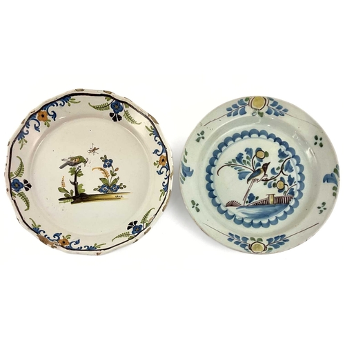 165 - Two French faience plates, late 18th century, painted with birds amongst foliage, diameter 22.7cm