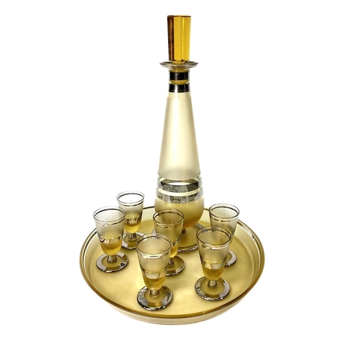 172 - A Continental frosted amber glass and silver lustre liqueur set including a decanter, tray and glass... 