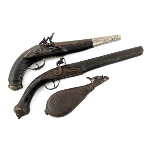 219 - Two Indian flintlock black powder dress pistols, smooth bore, one with foliate silver coloured metal... 