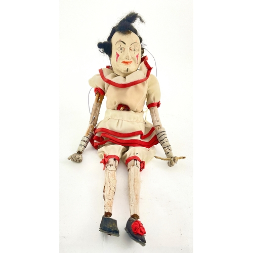 257 - An early 20th century fully articulated, hand-painted wood clown puppet, of Commedia Dell'Arte type ... 