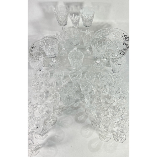 26 - A large part Waterford crystal suite, Kenmare cut, including eight wine goblets, over twenty five sh... 