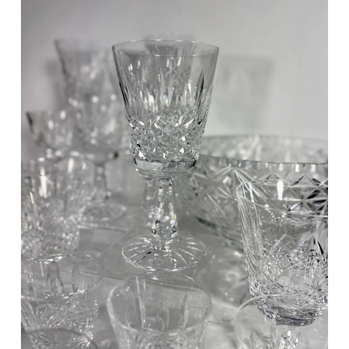 26 - A large part Waterford crystal suite, Kenmare cut, including eight wine goblets, over twenty five sh... 