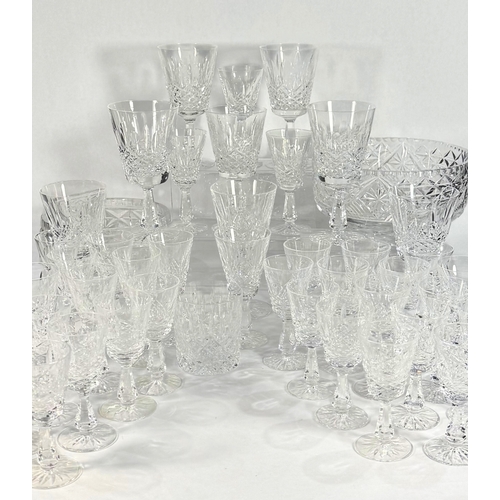 26 - A large part Waterford crystal suite, Kenmare cut, including eight wine goblets, over twenty five sh... 