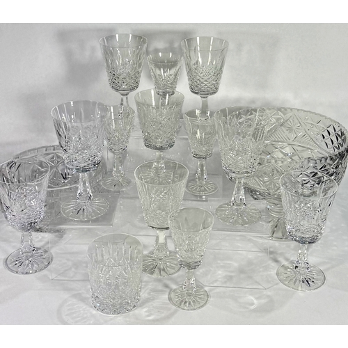 26 - A large part Waterford crystal suite, Kenmare cut, including eight wine goblets, over twenty five sh... 