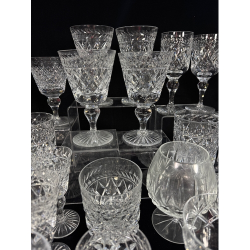 25 - A collection of glass including wine goblets, tumblers, sherry glasses, decanters etc., also a silve... 