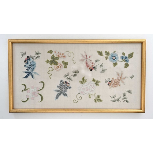 14 - A pair of Chinese silk embroidered panels, depicting fish amongst peony and lotus flowers, 43cm x 22... 