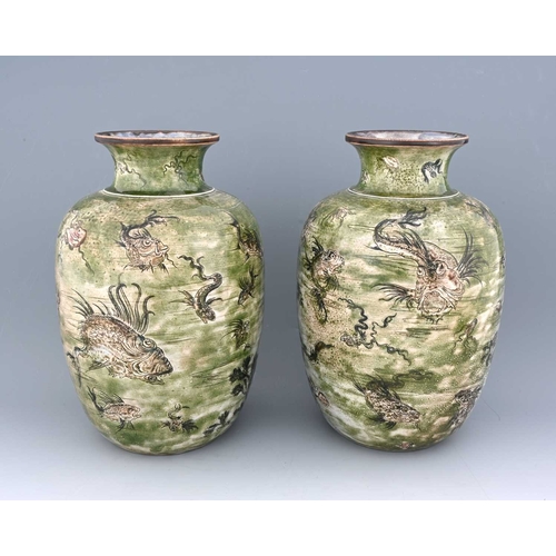 22 - Robert Wallace Martin for Martin Brothers, a large pair of Aquatic stoneware vases, 1897, shouldered... 