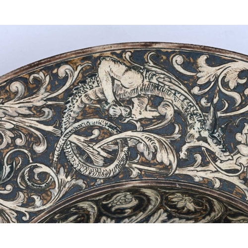 30 - Edwin and Walter Martin for Martin Brothers, a stoneware Renaissance Dragon dish, 1889, Armada form,... 