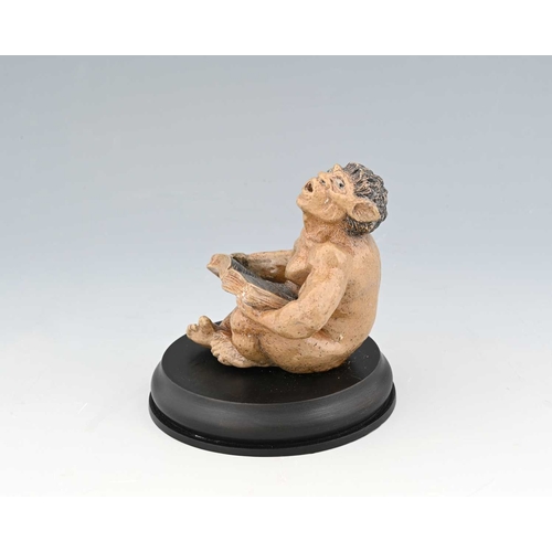 40 - R W Martin for Martin Brothers, a sculptural stoneware figure of a musical imp, circa 1900, modelled... 