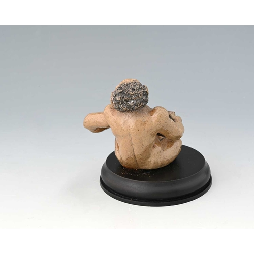 40 - R W Martin for Martin Brothers, a sculptural stoneware figure of a musical imp, circa 1900, modelled... 