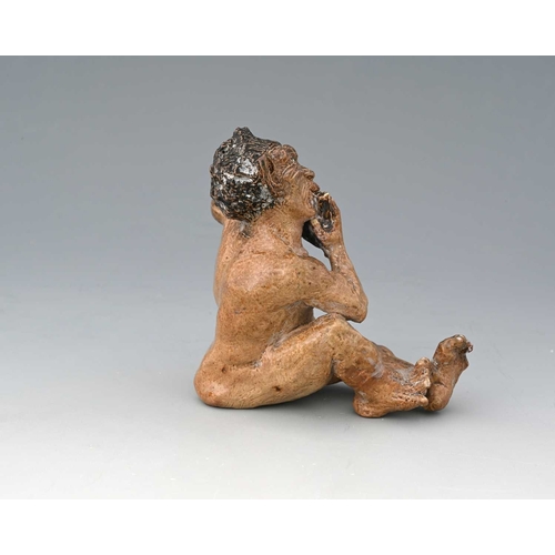 42 - Robert Wallace Martin for Martin Brothers, a sculptural stoneware figure of a musical imp, circa 190... 