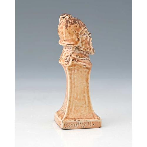 43 - Robert Wallace Martin for Martin Brothers, a stoneware pawn chess piece, 1901, modelled as the bust ... 