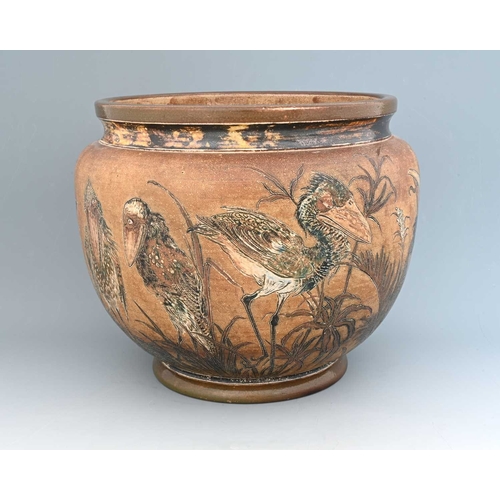 46 - Robert Wallace Martin for Martin Brothers, a large stoneware Wally Bird jardiniere, 1893, shouldered... 