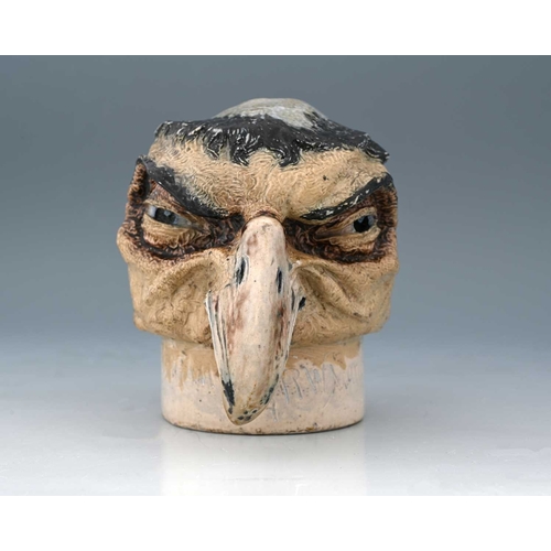 49 - Robert Wallace Martin for Martin Brothers, a characterful stoneware bird head sculpture, 1889, model... 