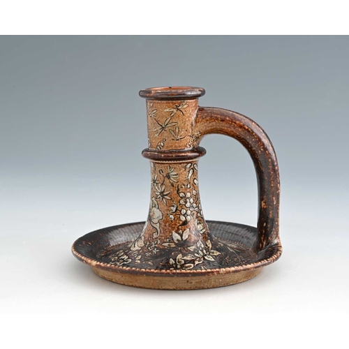 8 - Edwin Martin for Martin Brothers, a stoneware wildflower chamberstick, 1891, splayed trumpet form wi... 