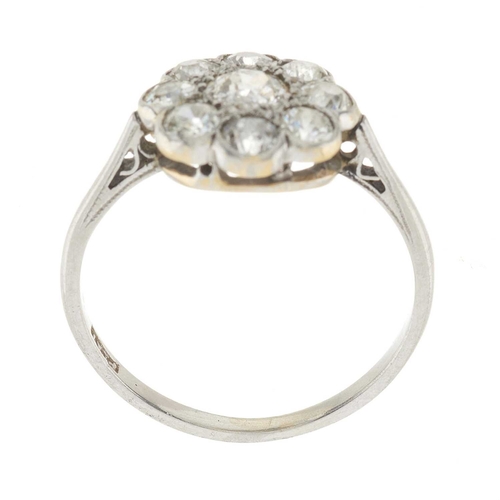 1 - An early 20th century platinum old-cut diamond cluster ring, estimated total diamond weight 1.10ct, ... 