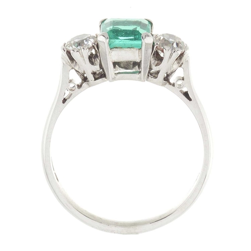 118 - An 18ct gold emerald and circular-cut diamond three-stone ring, emerald estimated weight 0.90ct, est... 