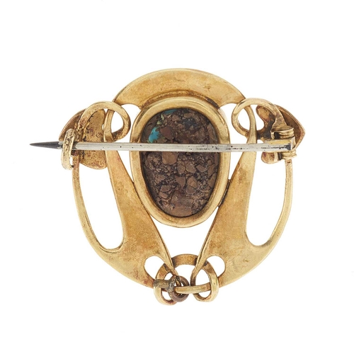 136 - Archibald Knox for Liberty & Co., an Art Nouveau gold turquoise cabochon brooch, design number 1122 ... 