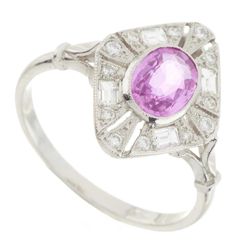 145 - A platinum pink sapphire and vari-cut diamond openwork dress ring, sapphire estimated weight 1ct, es... 