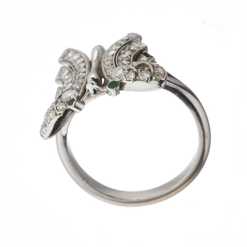 153 - A mid 20th century vari-cut diamond butterfly ring, with green gem eyes, estimated total diamond wei... 