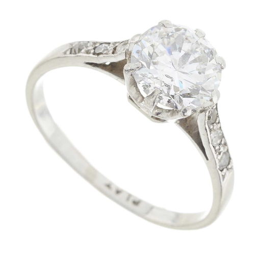 166 - A mid 20th century platinum circular-cut diamond single-stone ring, with old-cut diamond line should... 