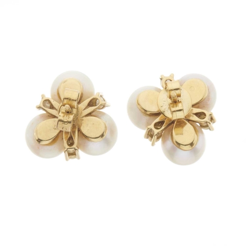 181 - A pair of 18ct gold cultured pearl cluster stud earrings, with brilliant-cut diamond highlights, est... 