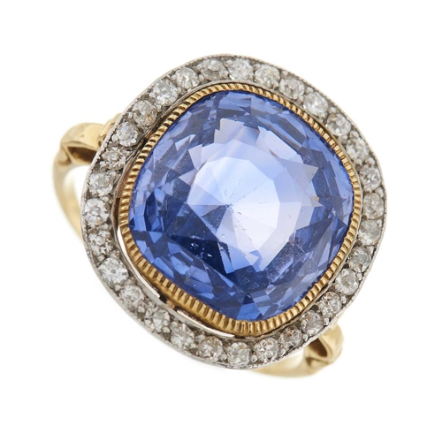 186 - A late 19th century gold cushion-shape sapphire and old-cut diamond cluster ring, with scrolling ope... 