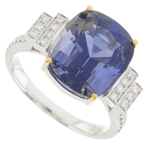 189 - An 18ct gold cushion-shape iolite dress ring, with brilliant-cut diamond stepped sides and similarly... 