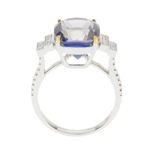 189 - An 18ct gold cushion-shape iolite dress ring, with brilliant-cut diamond stepped sides and similarly... 